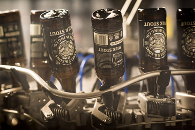 Cassels Brewery production - filling milk stout bottles