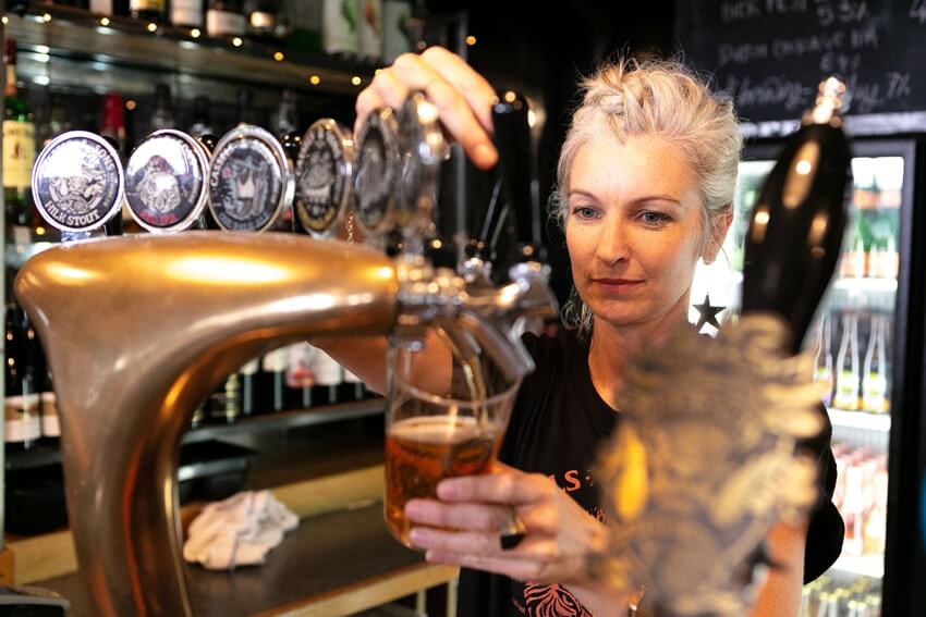 Pouring craft beer at the Cassels Brewery Bar in Christchurch